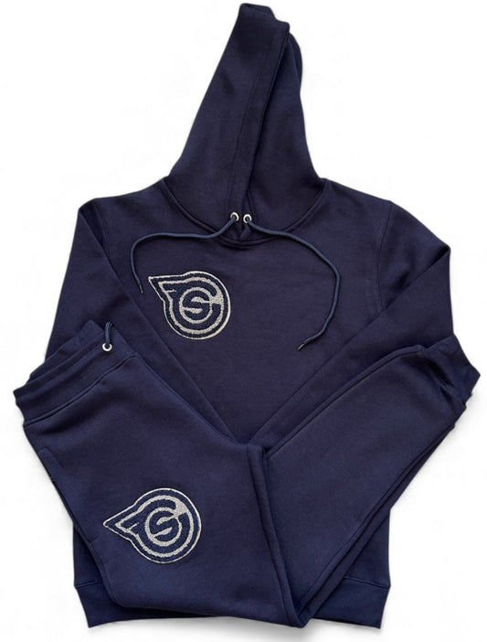 Navy blue hoodie and pants set with a logo on a white background